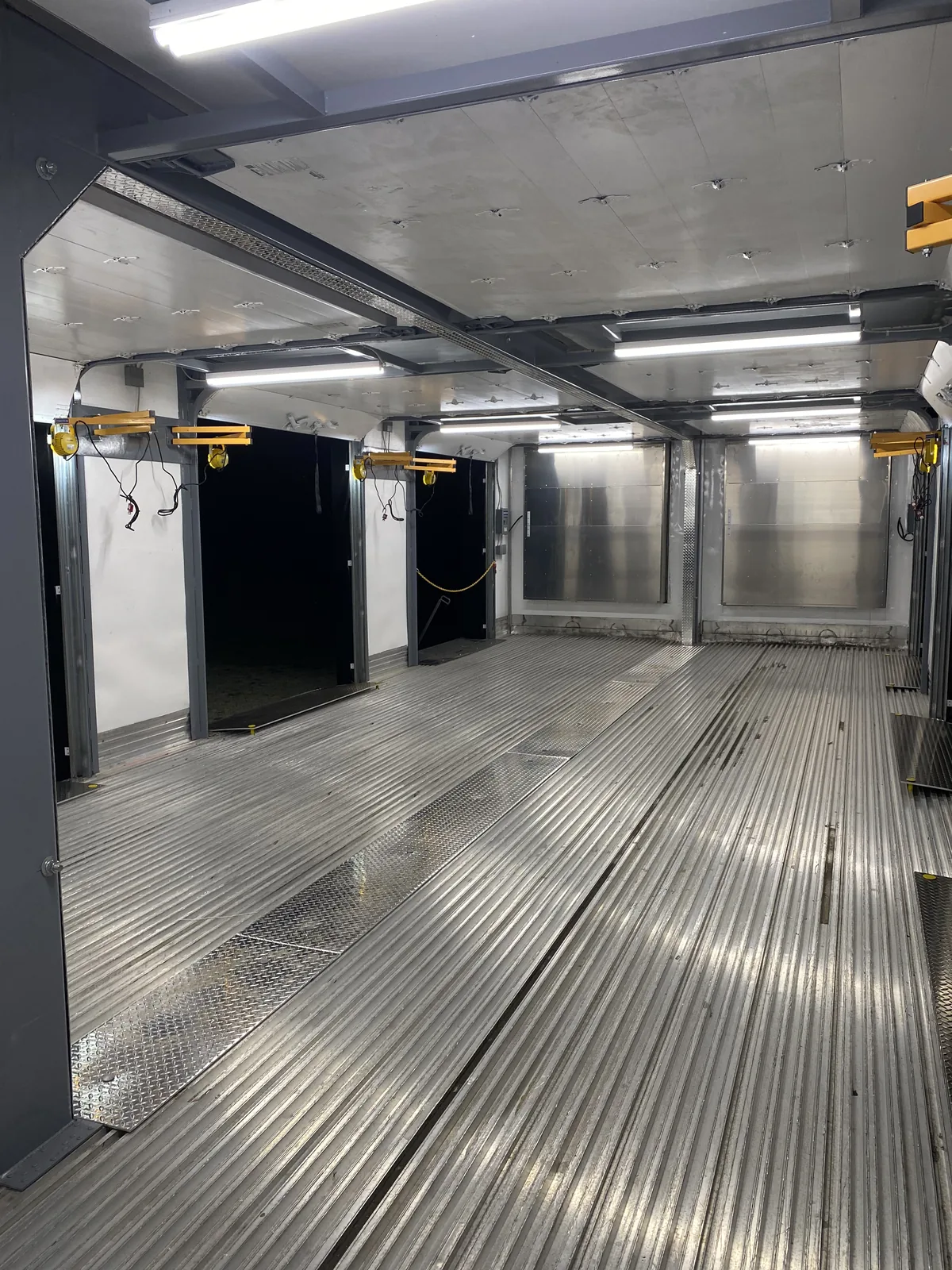 Finished mobile dock interior with raised roll-up doors