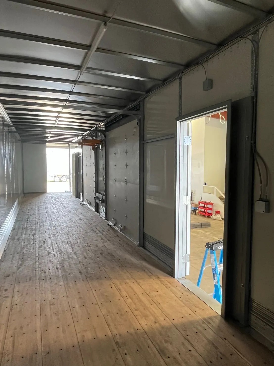 Interior showing multiple roll-up dock doors